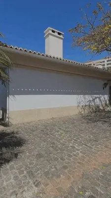 a white building with a white tower on top of it at House Pilar close to Funchal in Funchal
