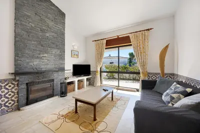 a bedroom with a bed with two towels on it at Casa 54 in Valverde