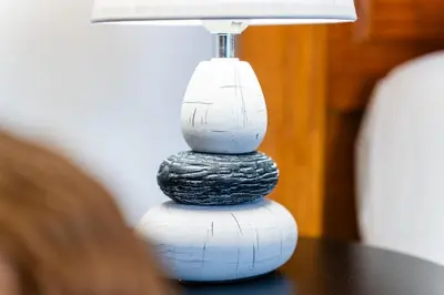 a lamp sitting on top of a table at GuestReady - Funchal Hideaway with BBQ in Funchal