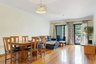 a dining room with a table and chairs at Agostinho Apartment Santa Cruz in Santa Cruz