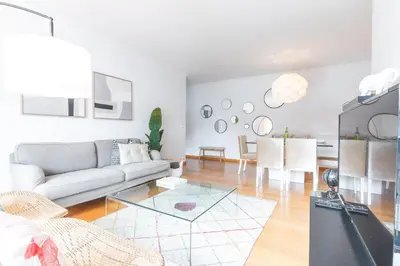 a living room with a couch and a table at Garajau Comfort Stay by Atlantic Holiday in Caniço