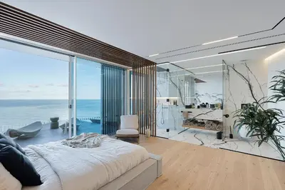 a bedroom with a bed and a view of the ocean at Aurora Residence - Ultra Luxury Ocean Cliff Edge Retreat in Arco da Calheta
