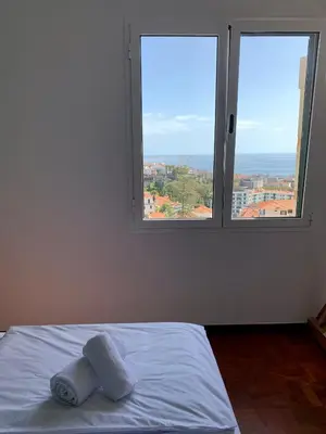 a view of a city from the top of a building at Residencial do Vale in Funchal