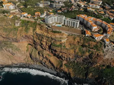 an aerial view of the edge of a cliff at Atlantic Residence Pool & Ocean View in Câmara de Lobos