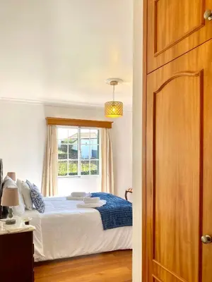 a bedroom with a bed and a window at 