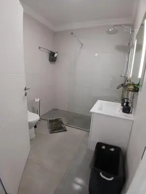 a small kitchen with a sink and a refrigerator at RJ Summer in Sagres