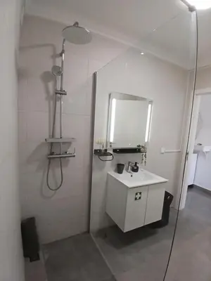 a kitchen with a counter top with a microwave at RJ Summer in Sagres