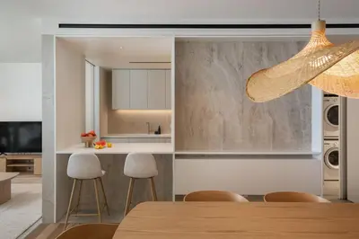 a kitchen and dining room with a table and chairs at Savoy Monumentalis XI Luxury with sea view in Funchal