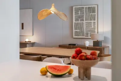a bowl of fruit on a table in a kitchen at Savoy Monumentalis XI Luxury with sea view in Funchal