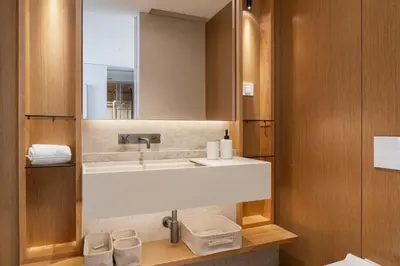 a bathroom with a sink and a mirror at Savoy Monumentalis XI Luxury with sea view in Funchal