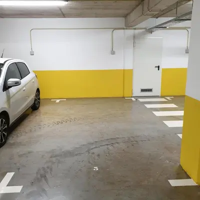 a parking garage with a car parked in it at Pilot Ocean View in Funchal