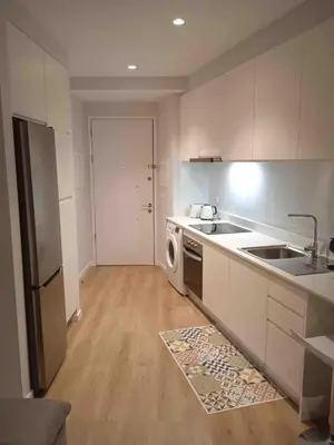 a kitchen with a sink and a dishwasher at Pilot Ocean View in Funchal