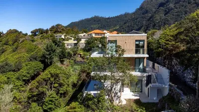 an aerial view of a house on a mountain at Mar Yam Sea - Ocean View by Atlantic Holiday in Arco de São Jorge