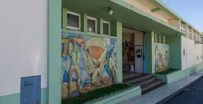 a building with a mural on the side of it at Casa do Moinho in Santa Cruz
