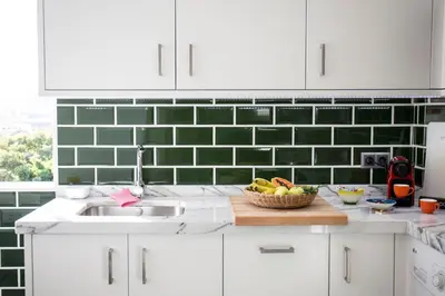 a kitchen with a sink and a bowl of fruit at Apt. Downtown 2 in Funchal