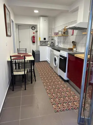 a bedroom with a bed with towels on it at Granny House Madeira in Funchal