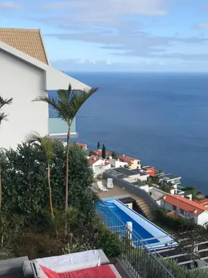 a view of the ocean from a resort at Villa Babel in Garajau