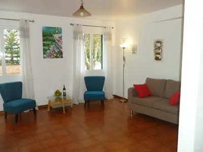 a living room with a couch and chairs at Apartment Alameda with Sea View in Machico