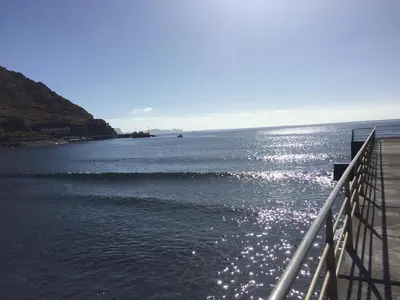 a view of the ocean from a pier at Apartment Alameda with Sea View in Machico