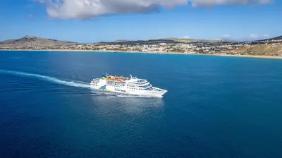 a cruise ship in the water with a beach at Casa da Maresia by An Island Apart in Porto Santo
