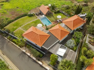 an overhead view of a house with an orange roof at Casas Da Vereda in Estreito da Calheta