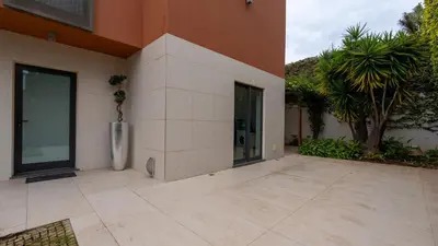 a room with a ping pong table and a ping paddle at Villa Vitoria - by LovelyStay in Funchal