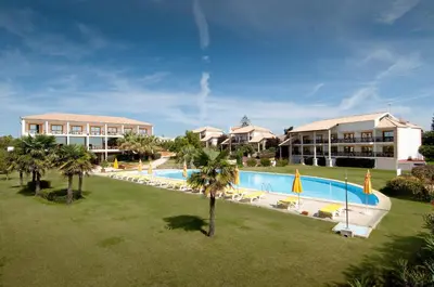 an aerial view of a resort with a swimming pool at Luzmar Villas in Luz