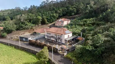 an aerial view of a house on a hill at Casa Os Manos in Santana