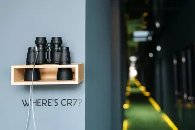 a group of black shoes sitting on a shelf at Pestana CR7 Funchal in Funchal