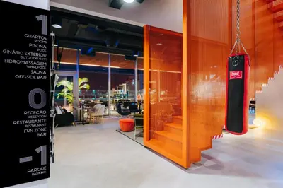 a conference room with a wall of glass at Pestana CR7 Funchal in Funchal