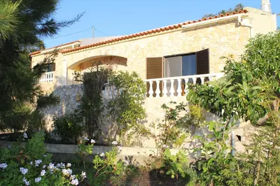 a house on the side of a mountain at Villa Boa Vista Sul - Terra da Eira - Raposeira in Vila do Bispo