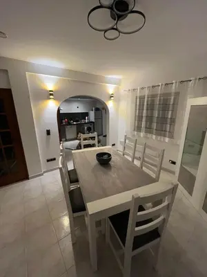 a dining room with a table and some chairs at Villa Boa Vista Sul - Terra da Eira - Raposeira in Vila do Bispo