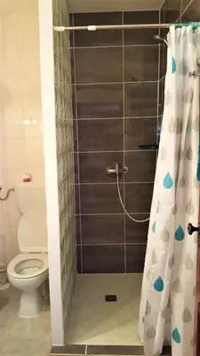 a bathroom with a shower with a toilet at Villa Boa Vista Sul - Terra da Eira - Raposeira in Vila do Bispo