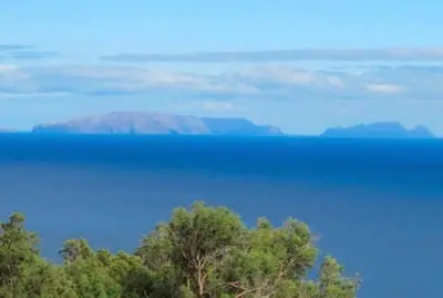 a view of a large body of water with trees at Plaza Charming Flat in Santa Cruz