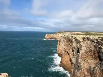 an aerial view of the ocean and a cliff at Casa GiGi in Sagres