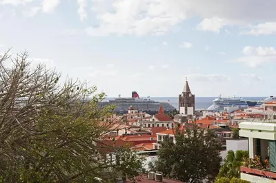 a view of a city with a cruise ship at Elias Garcia II by An Island Apart in Funchal