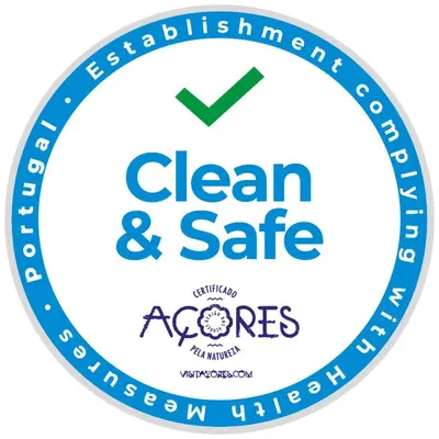 a label with the clean and safe acorenes logo at Vigia da Areia in São Lourenço