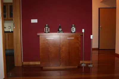 a room with a counter with three tea pots on it at Cozy and Bright Apartment in Machico