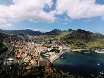 an aerial view of a city and a beach at Moradia Cor de Rosa in Machico