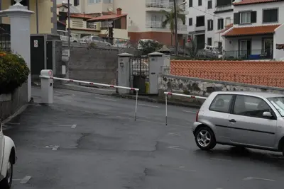 a car parked in a parking lot with barriers at Olivia's Place in Funchal