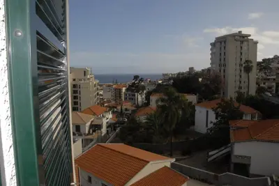 a view of a city from a building at Olivia's Place in Funchal