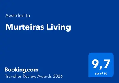 a blue sign with the words miracles living on it at Murteiras Living in Funchal