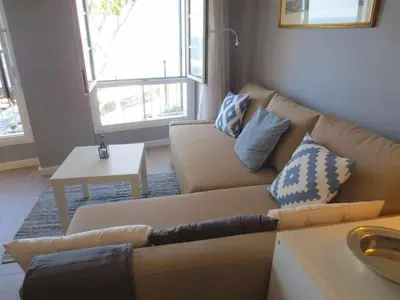 a living room with a couch and a table at Barreirinha II Near Old Town With Nice Ocean Views in Funchal