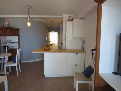a kitchen with white cabinets and a counter top at Barreirinha II Near Old Town With Nice Ocean Views in Funchal