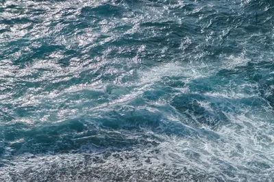 a large body of water with waves in it at Barreirinha II Near Old Town With Nice Ocean Views in Funchal