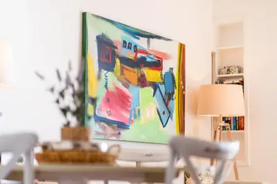 a painting on the wall of a living room at Lido Mar - Hotels area in Funchal