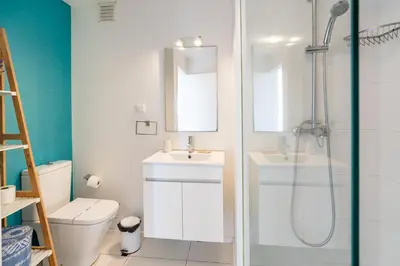 a bathroom with a shower and a sink and a toilet at Lido Mar - Hotels area in Funchal