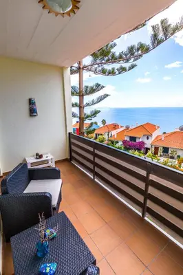 a balcony with a view of the ocean at Vista Oceano II in Caniço