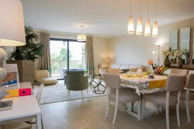 a kitchen and dining room with a table and chairs at GuestReady - Nora Premium in Funchal