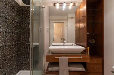 a bathroom with a sink and a shower at Casa Branca with garden by Holiday Rental Madeira in Funchal